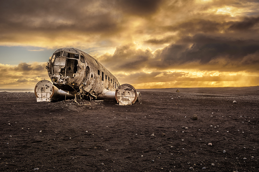 The DC-3 plane that crash landed on this beach in 1973 was thought to be wrecked due to pilot error, but the mystery was never solved.